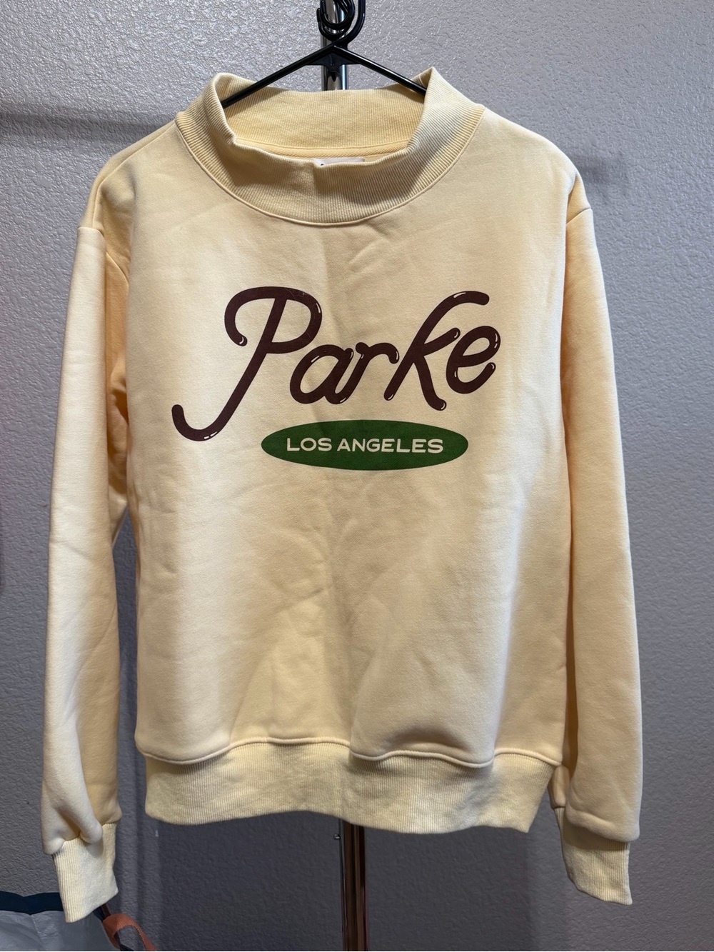 Parker Crewneck Sweatshirt in Cream with Brown Logo and Green Detail
